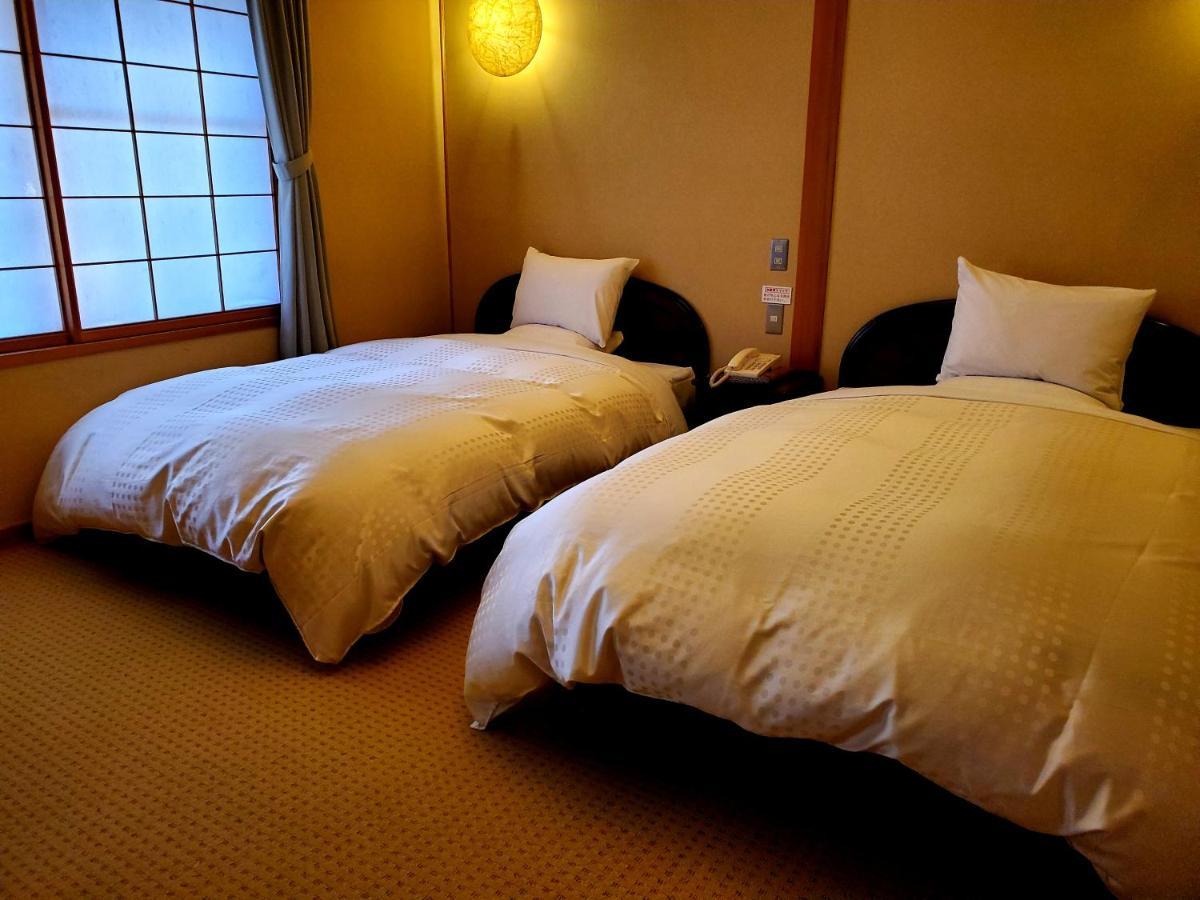 Ryotei Tanokura Hotel Yufu Eksteriør billede
